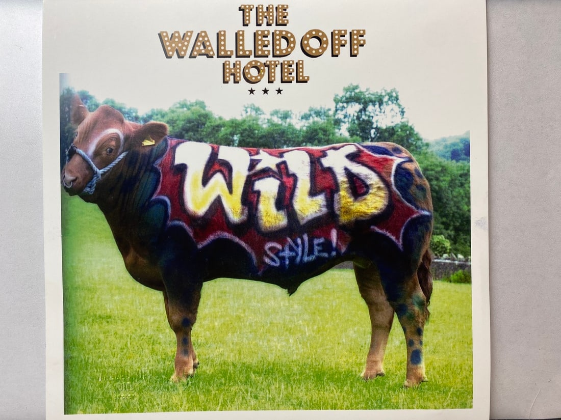 Banksy, The Walled Off Hotel, Limited Edition, Original Print.: 2022 Walled Off Hotel Artist Print on paper, Solid Finishing: Classic (250 gsm gloss) Limited Edition of 3000 Numbered and Stamped / seal Sizes- 21cm X 21cm The Walled Off Hotel Invoice Printed and