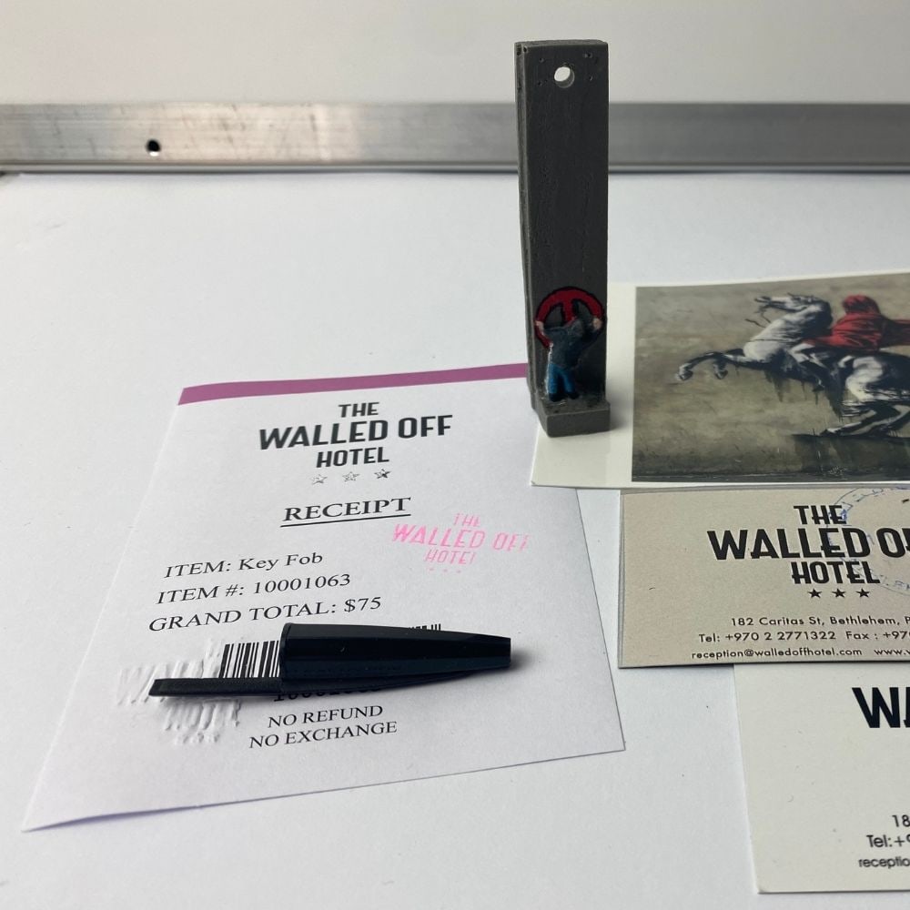 The Walled Off Hotel, Banksy, key Fob Sculpture. Original, Limited Edition,, - 2