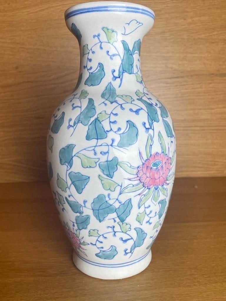 Vintage Chinoiserie Chinese Vase, Made 1960s: A Chinese Chinoiserie vintage vase dated around 1960's. A fairly large piece but slim and sleek with a rounded body going into a slimer neck and finished with a tapered out rim. This beautiful vase ha