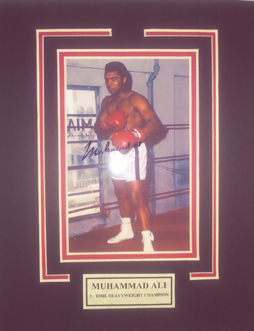 Muhhammed Ali signed Photo matted With Certificate: Muhhammed Ali signed and meted Photo With Certificate. mat size approx: 8x10 inchs