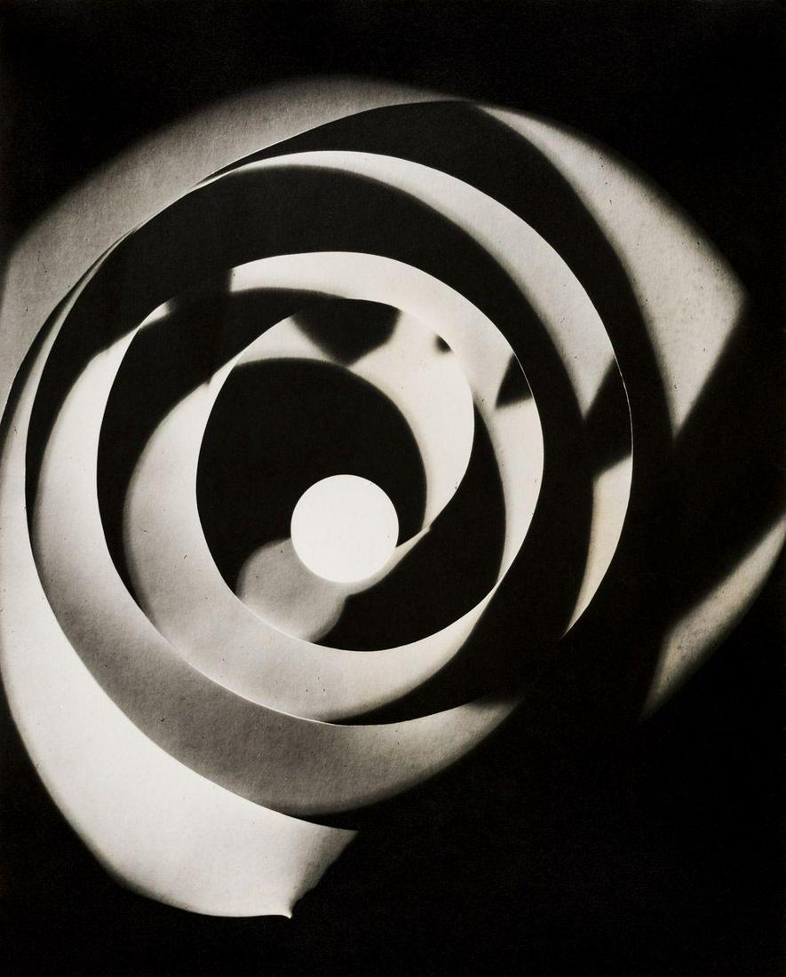 Man Ray - rayograph spiral 1925: Man Ray - rayograph spiral 1925 photolito. 11x12.5 matted inch.