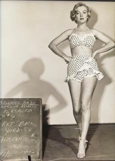 Marilyn Monroe's bathing suit from Let's Make It Legal,: Marilyn Monroe's bathing suit from Let's Make It Legal, 1951. Vintage printing Photolitho, The actual items are crisp images Black on black archival matting size Approx: 16" x 13"