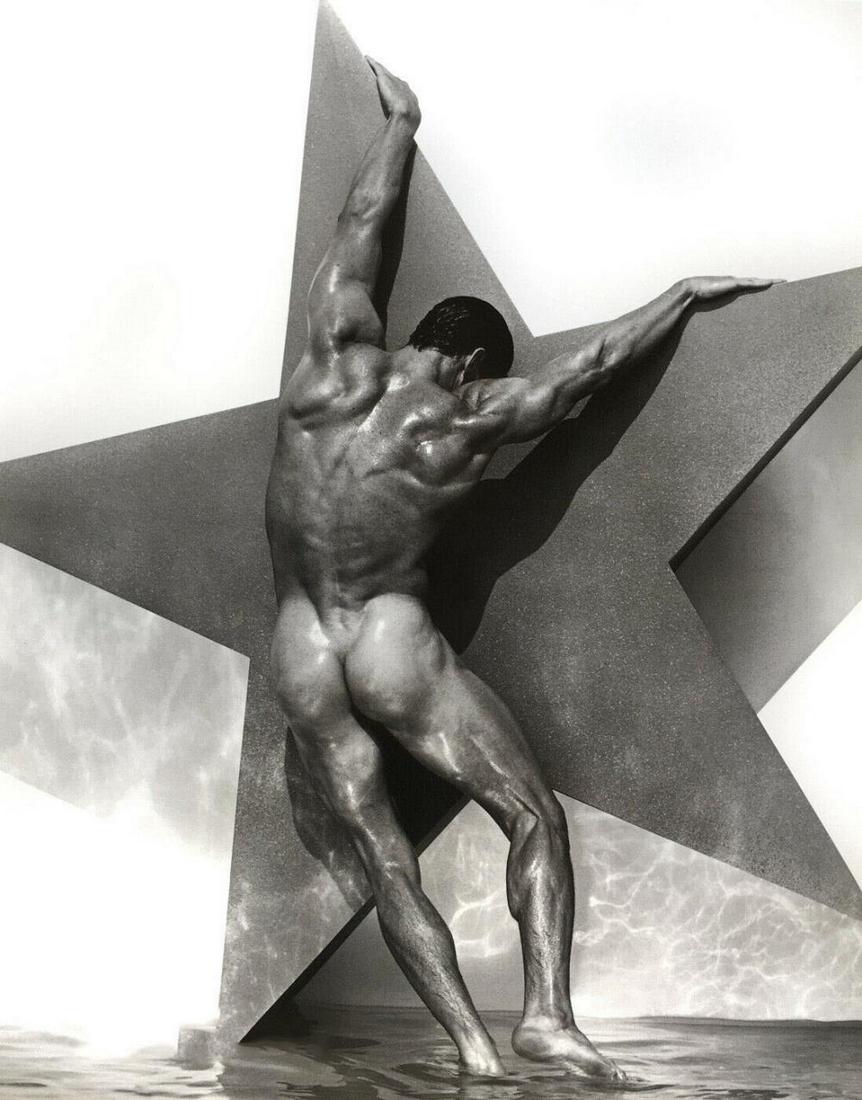 HERB RITTS, Muscle man model, 1992: Photographer: Herbert "Herb" Ritts (American, 1952 - 2002) - renowned fashion, art and celebrity photographer.Subject: "Male Nude With Star, Hollywood".Date Of Negative: 1992Type Of Print: Fine Duoton