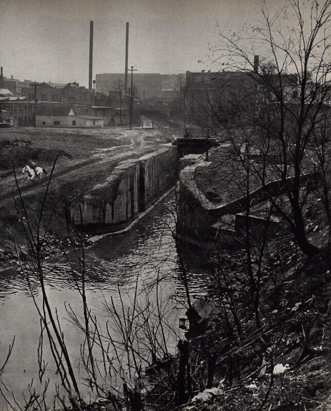 Andre Kertesz, Industrial Sewer AKRON OHIO: Photographer: Andre Kertesz (Born Hungary, 1894 - 1985) - world renowned photographic artist.Title: "Akron"Date Of Negative: circa 1947, Akron, OhioType Of Print: Authentic Vintage Sheet Fed Photograv