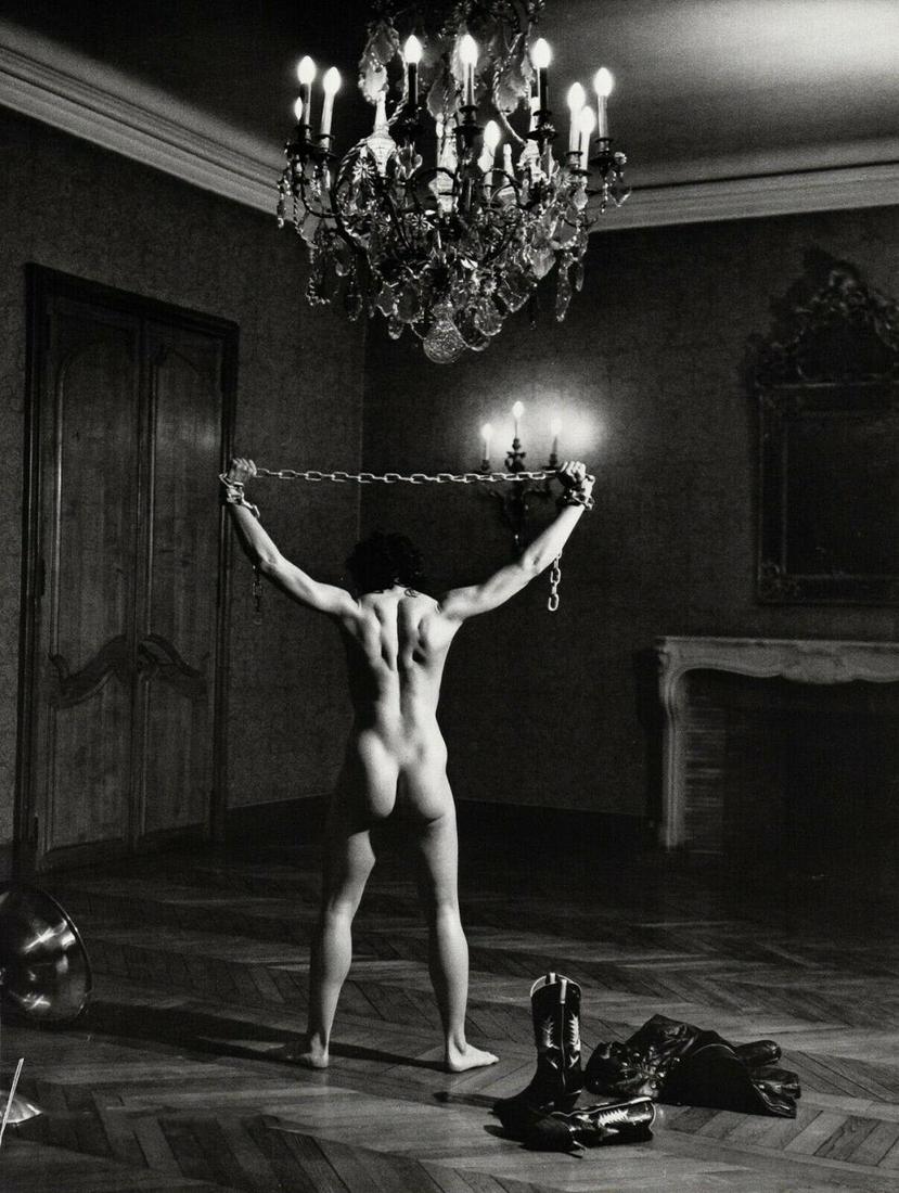 HELMUT NEWTON, LISA LYON Chains, 1980: Photographer: Helmut Newton (Germany, 1920 - 2004) - best known for his erotically charged highly stylized images, Helmut Newton was one of the most influential fashion photographers of all time.Title