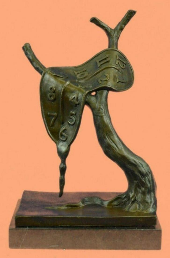 Salvador Dali, (After) "Melting Time" Bronze Sculpture: Salvador Dali (After) - "Melting Time"Width Dimensions: 8" (20 cm.)Height without base: 12" (30.5 cm.)Weight : 10 LBS (4.5 Kg.)100% bronze and handmade, this sculpture was cast using the "Lost Wax Met