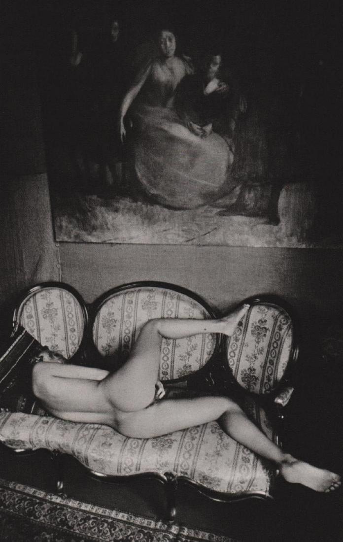 Jeanloup Sieff, woman awake on sofa 1974: Photographer: Jeanloup Sieff (French, 1933 - 2000) - French photographer critically acclaimed for his portraits, landscapes, nude studies and fashion imagery. He often made use of a wide angle lens, i