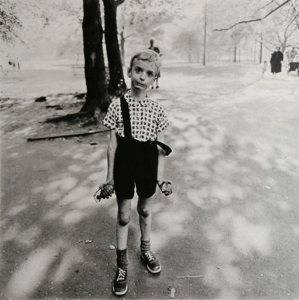DIANE ARBUS - Child with Toy Hand Grenade, 1962: Photographer: Diane Arbus Born: March 14, 1923, New York, New York, United States. Died: July 26, 1971, Westbeth Artists Housing, New York, United States. Diane Arbus was an American photographer. Arb