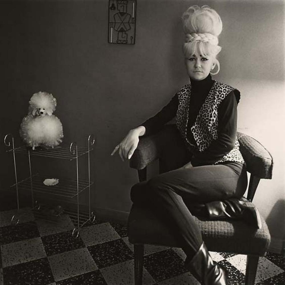Diane Arbus, Lady bartender at home with a souvenir: Photographer: Diane Arbus Born: March 14, 1923, New York, New York, United States. Died: July 26, 1971, Westbeth Artists Housing, New York, United States. Diane Arbus was an American photographer. Arb