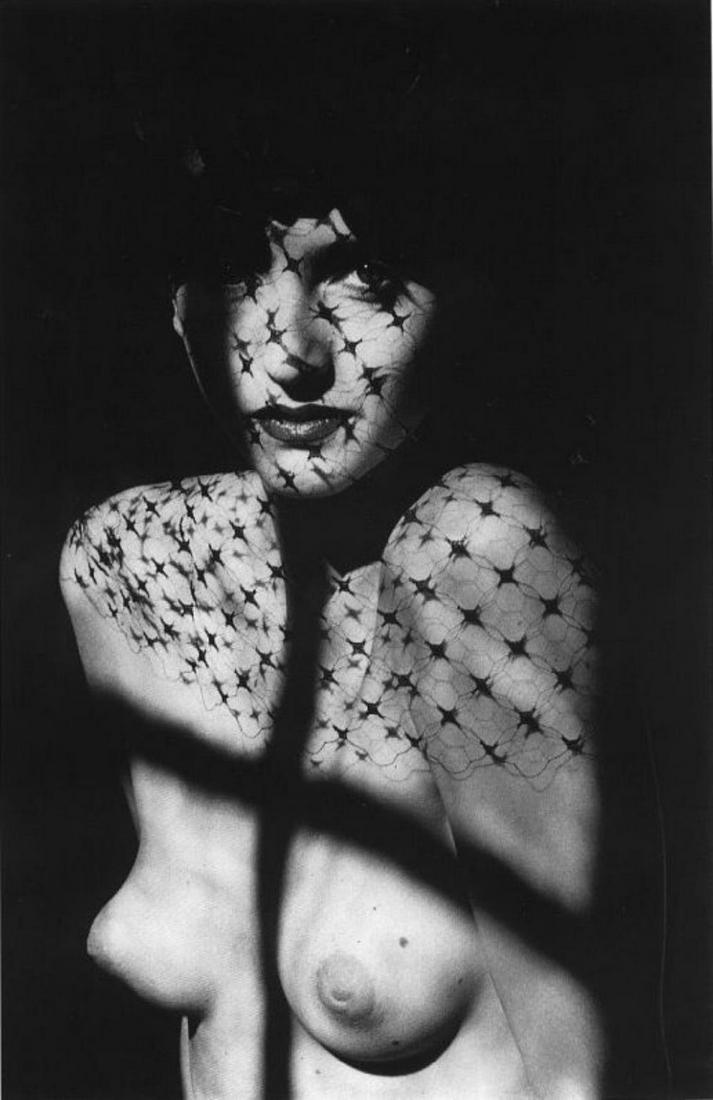 Jeanloup Sieff, woman with veil, Paris 1985: Photographer: Jeanloup Sieff (French, 1933 - 2000) - French photographer critically acclaimed for his portraits, landscapes, nude studies and fashion imagery. He often made use of a wide angle lens, i