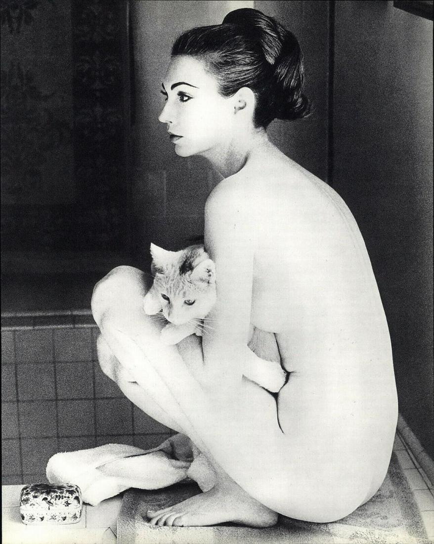 John Rawlings, 1966 Cat Hug Female Nude Model: About the Photographer: John Rawlings (1912-1970) was a Cond? Nast Publications fashion photographer from the 1930s through the 1960s. Rawlings left a significant body of work, including 200 Vogue mag