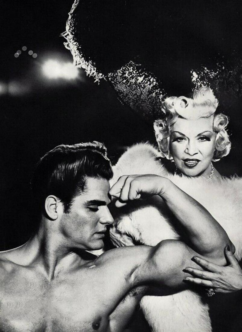 RICHARD AVEDON, 1954 Mae West & Nude Male Muscle: Photographer: Richard Avedon (American, 1923 - 2004) - internationally renowned portrait and fashion photographer, one of the most important and influential photographers during the last half of the t