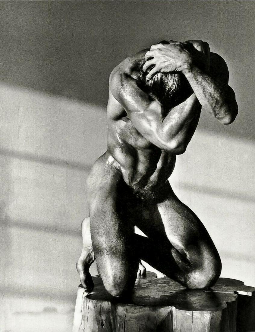 HERB RITTS, 1987 Nude Muscle Man: Photographer: Herbert "Herb" Ritts (American, 1952 - 2002) - renowned fashion, art and celebrity photographer. Title: "Male Nude On Log, Hollywood" Subject: Male Nude Study Type Of Print: Fine Duotone