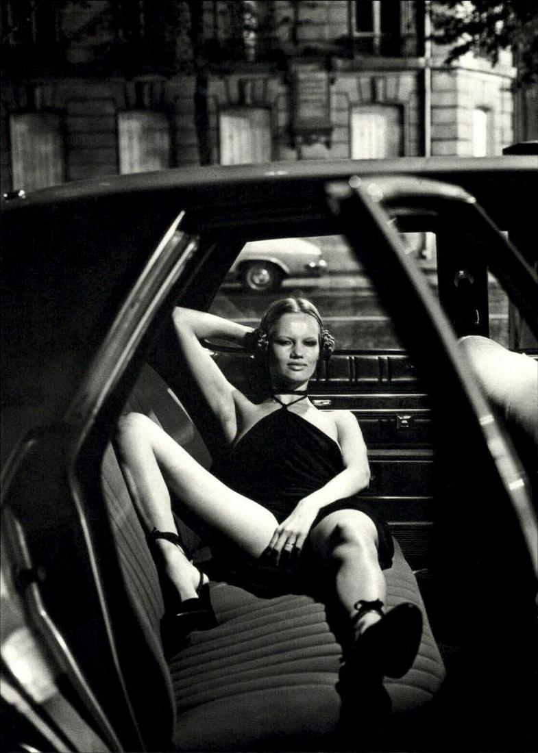HELMUT NEWTON, 1976 Female Fashion Model In Car: Photographer: Helmut Newton (Germany, 1920 - 2004) - best known for his erotically charged highly stylized images, Helmut Newton was one of the most influential fashion photographers of all time. Titl