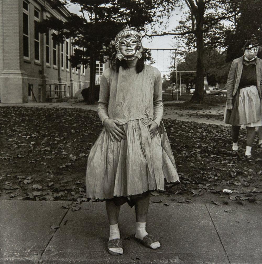 DIANE ARBUS - Girl in Mask. 1970/71: Photographer: Diane Arbus Born: March 14, 1923, New York, New York, United States. Died: July 26, 1971, Westbeth Artists Housing, New York, United States. Diane Arbus was an American photographer. Arb