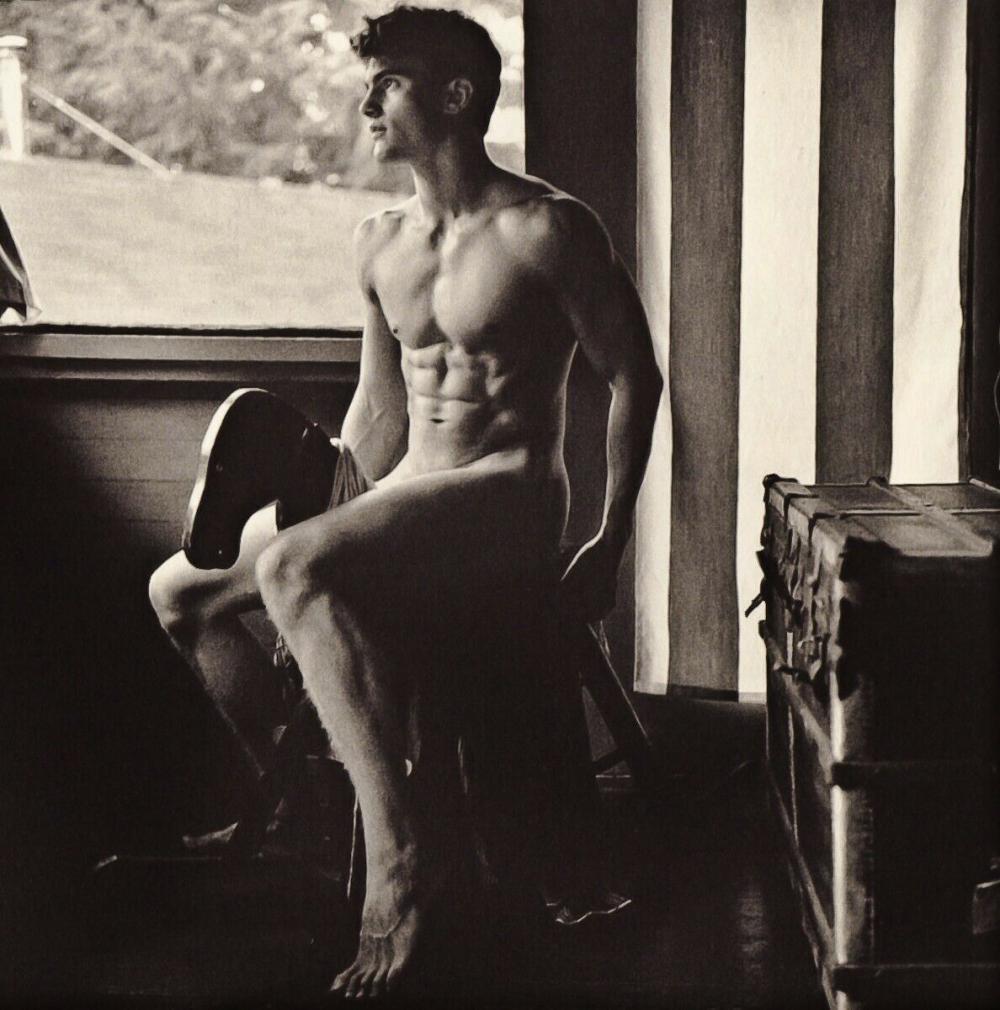 BRUCE WEBER, 1990's Male Nude On Toy Horse: Photographer: Bruce Weber (American, b. 1946) - internationally renowned American fashion photographer best known for his racy, erotically charged imagery. Weber has shot the ad campaigns of Calvin Kl