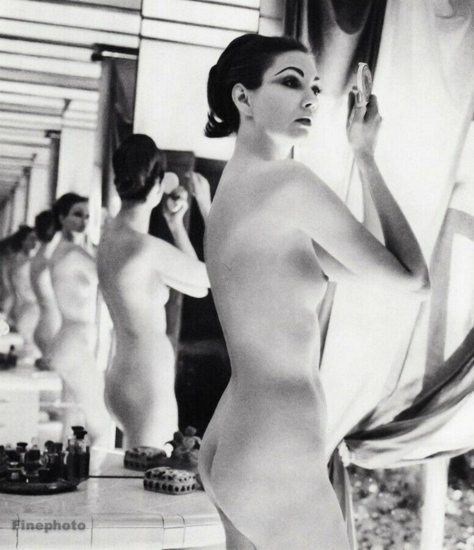 John Rawlings, 1966 Mirrors Female Nude: About the Photographer: John Rawlings (1912-1970) was a Condé Nast Publications fashion photographer from the 1930s through the 1960s. Rawlings left a significant body of work, including 200 Vogue ma