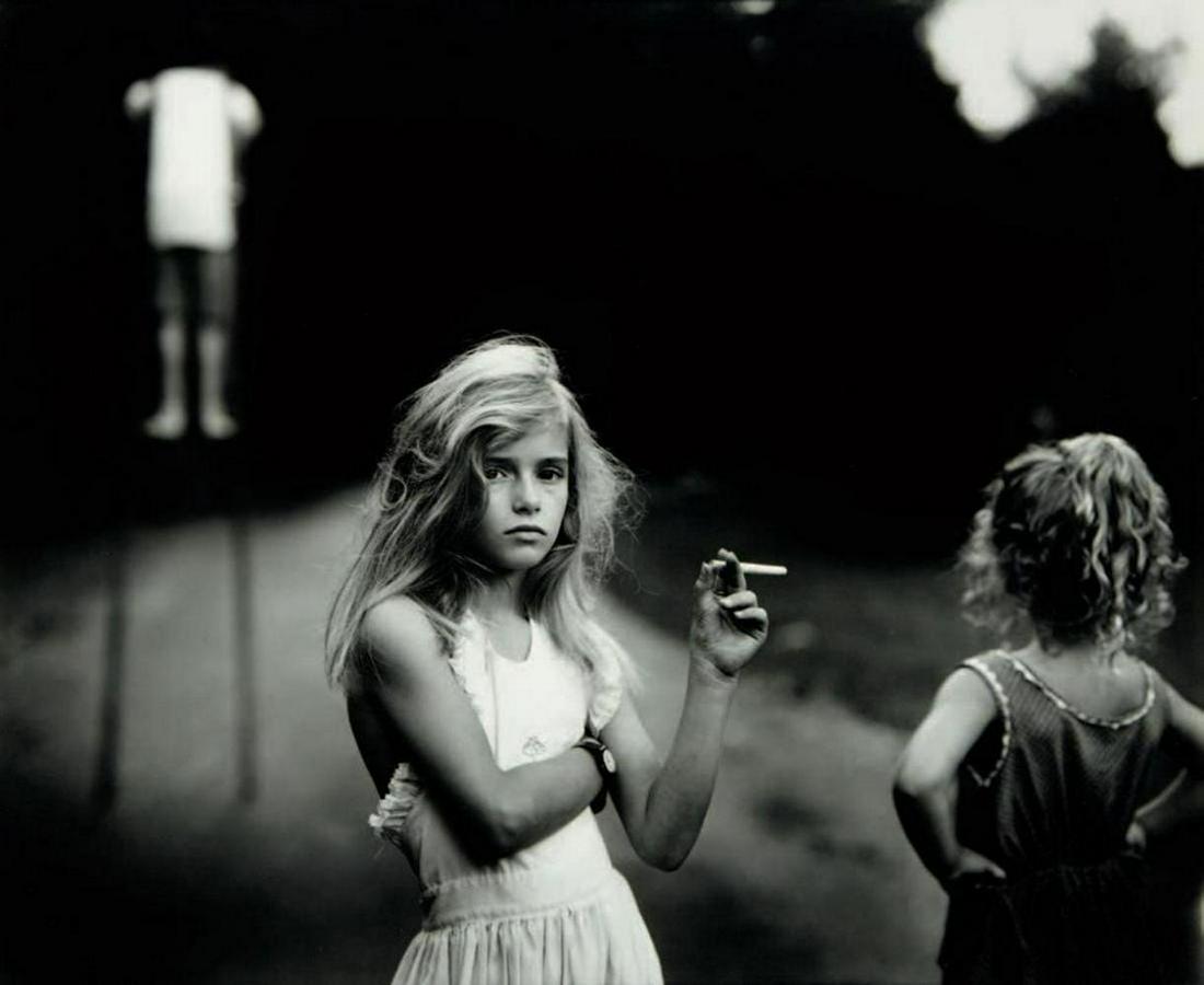 Sally Mann, Candy cigarette, 1989, Photogravure: Photographer: Sally Mann is an American photographer, widely known for her large-format, black-and-white photographs - at first of her young children, then later of landscapes suggesting decay and dea