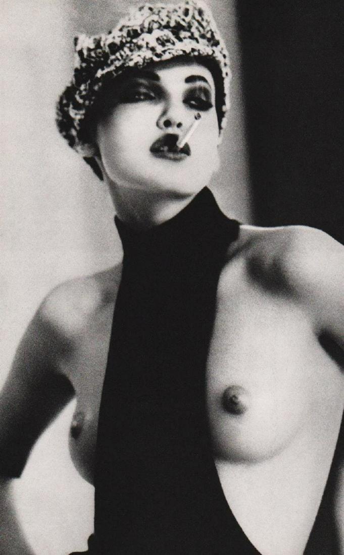 ELLEN VON UNWERTH - Smoky Nadja, Paris, 1991: Photographer: Ellen von Unwerth is a German photographer best known for her playfully erotic images of female pop musicians and models. Over the course of her career, the artist has photographed Britn