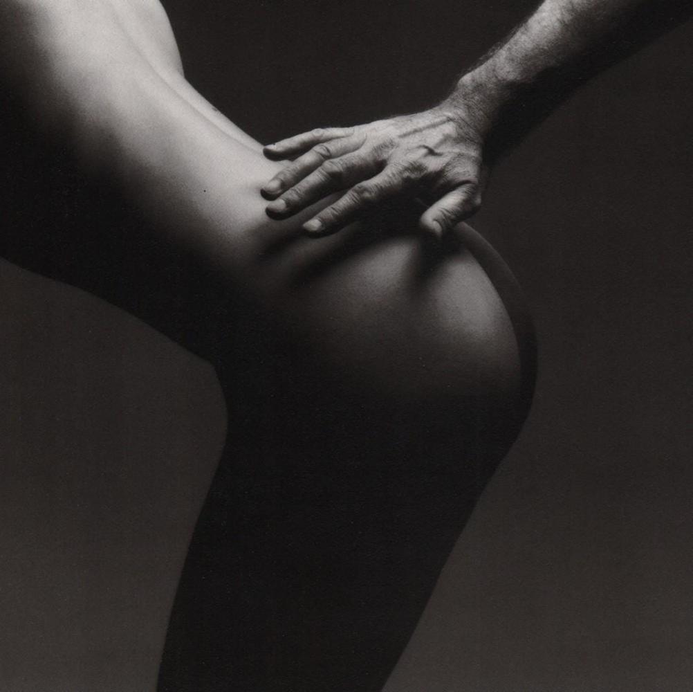 JEANLOUP SIEFF- Under the Hand of P.A.B., Paris, 1979: About the Photographer: Jeanloup Sieff was known for his work with New York fashion magazines. Nudes and fashion was much of his work but also traveled to many parts of Europe. Title: Under the Hand o