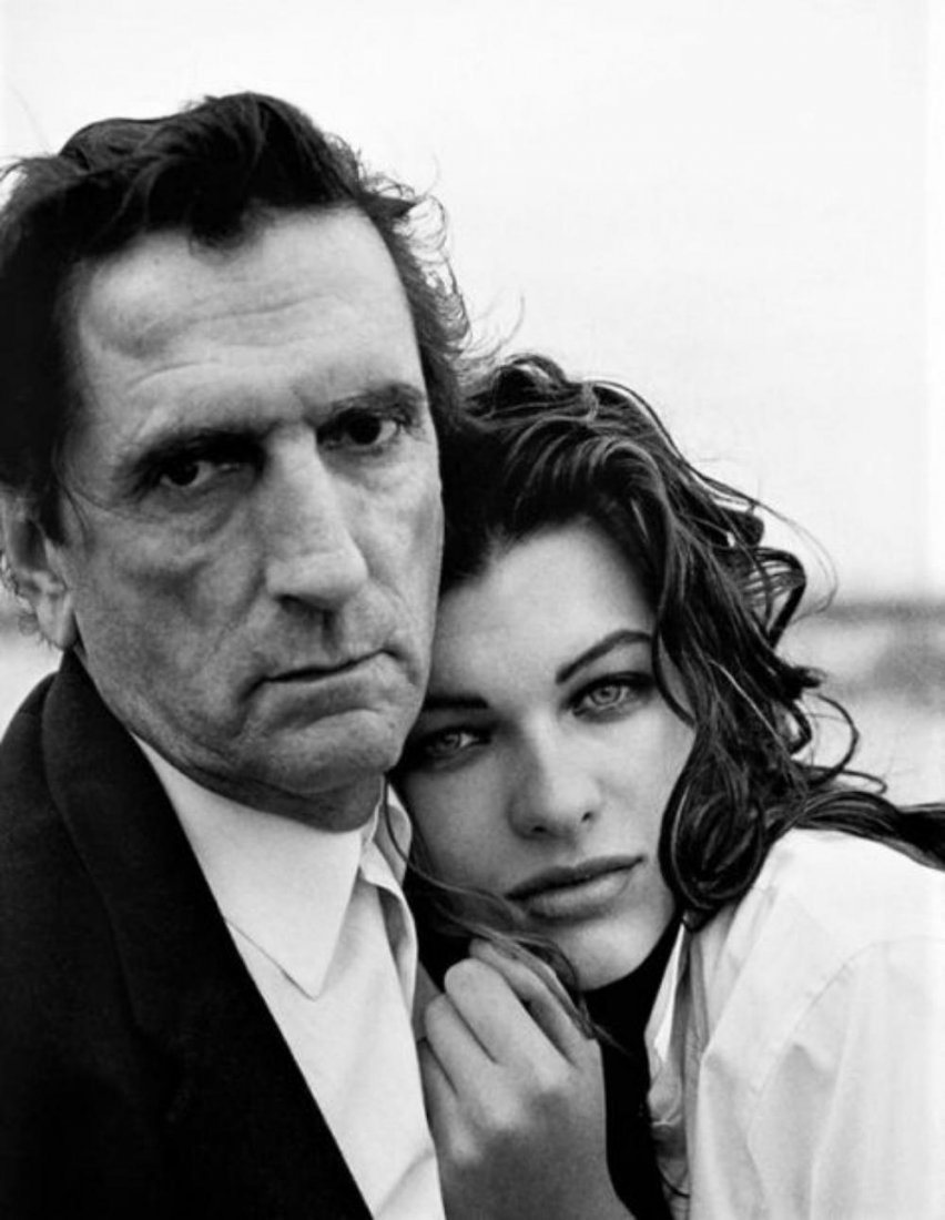 Peter Lindbergh, Milla Jovovich & Harry Dean, 1990: Photographer: Peter Lindbergh was a German fashion photographer and film director. He had studied arts in Berlin and Krefeld, and exhibited his works before graduation. In 1971, he turned to photograp