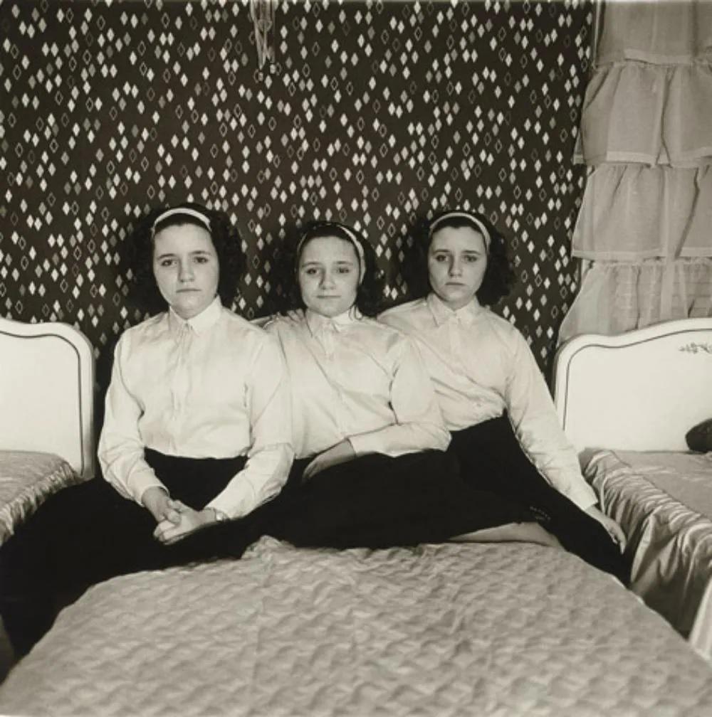 DIANE ARBUS - Triplets in their Bedroom, NJ, 1963: Photographer: Diane Arbus Born: March 14, 1923, New York, New York, United States. Died: July 26, 1971, Westbeth Artists Housing, New York, United States. Diane Arbus was an American photographer. Arb