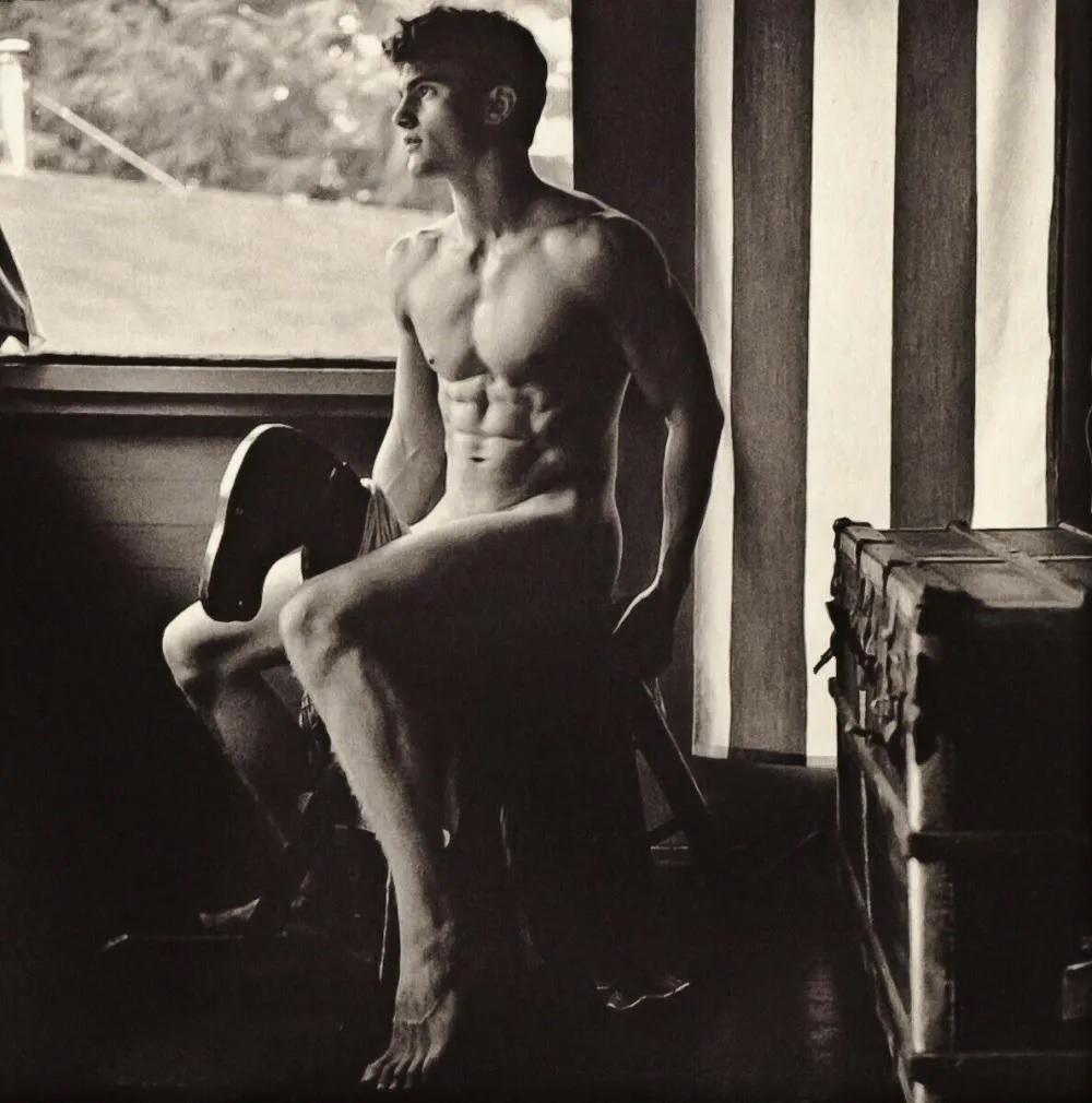 BRUCE WEBER, 1990's Male Nude On Toy Horse: Photographer: Bruce Weber (American, b. 1946) - internationally renowned American fashion photographer best known for his racy, erotically charged imagery. Weber has shot the ad campaigns of Calvin Kl