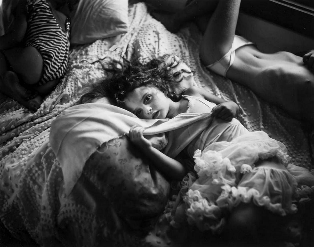 SALLY MANN - Naptime , 1989: Photographer: Sally Mann is an American photographer, widely known for her large-format, black-and-white photographs at first of her young children, then later of landscapes suggesting decay and death
