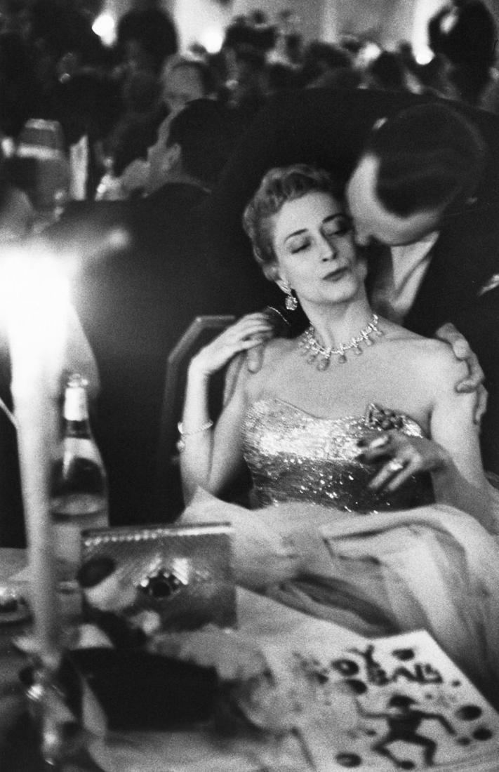 Robert Frank, Charity Ball, New York, 1954: Photographer: Robert Frank (1924-2019) was a Swiss photographer and documentary filmmaker, who became an American binational. His most notable work, the 1958 book titled The Americans, earned Frank co