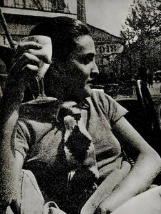 Man Ray, Meret Oppenheim, at The Coffee Shop, 1930, First Edition: Photographer: Man Ray (American born, 1890 - 1976) - Considered one of the most influential artists of the 20th century Man Ray lived most of his life in Paris, France. Best described as a modernist,