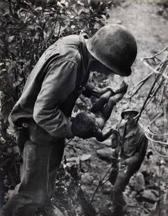 W. Eugene Smith, Saipan (Soldier Holding Baby), 1944: Photographer: Vivian Dorothy Maier, (1918-1978) William Eugene Smith was an American photojournalist. He has been described as "perhaps the single most important American photographer in the developme