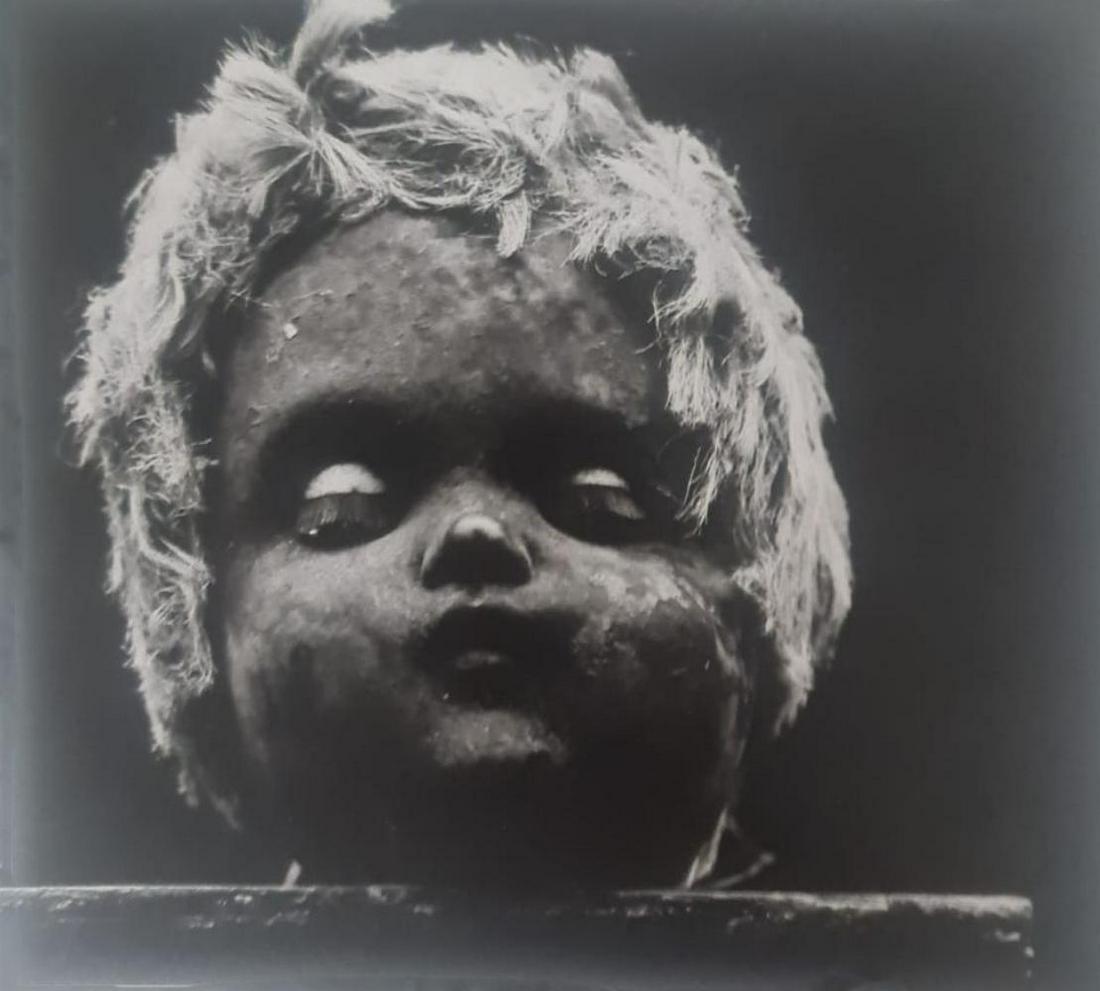 Ralph Eugene, Blond doll's head, 1959: Photographer: Ralph Eugene Meatyard (May 15, 1925 - May 7, 1972) was an American photographer from Normal, Illinois, U.S. Meatyard purchased his first camera in 1950 to photograph his newborn first ch