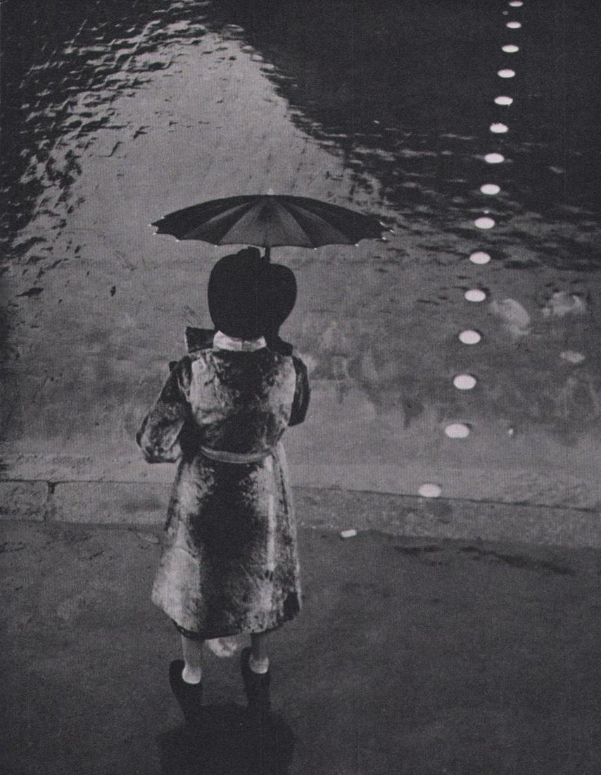 Brassai, Rue De Rivoli, 1937: Photographer: Brassai (pseudonym of Gyula Halsz, 1899 - 1984) - historically important Hungarian photographer, sculptor and filmmaker who rose to fame in France. Title: Rue De Rivoli Date Of Negative: