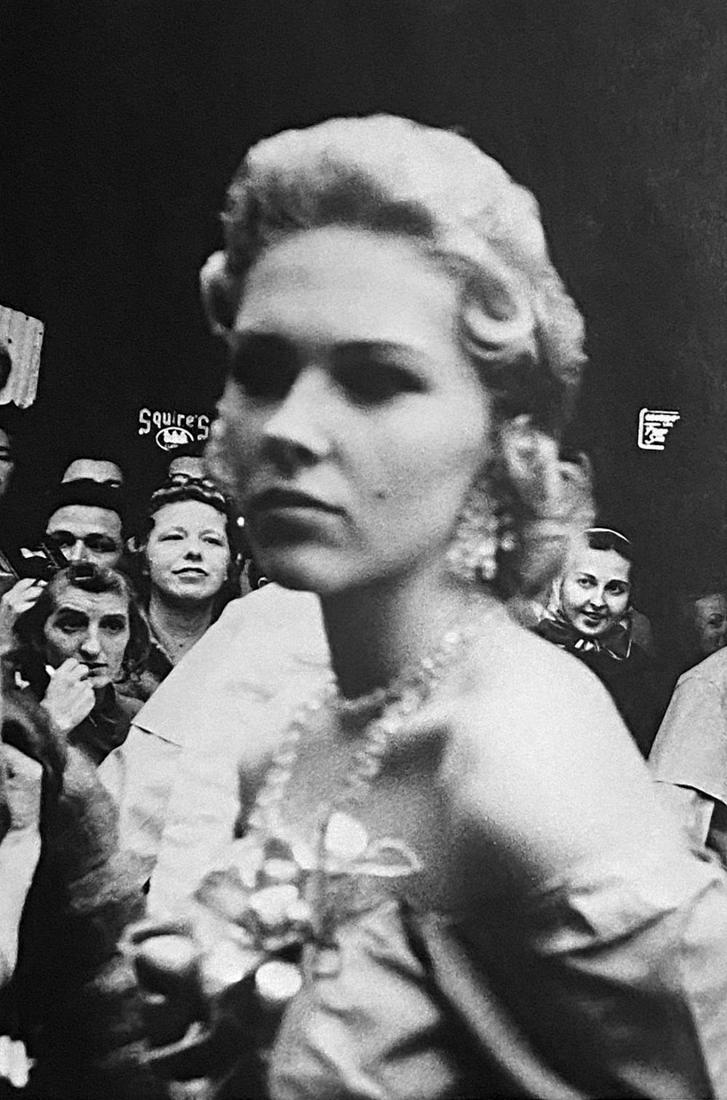 Robert Franks, Movie Premiere- Hollywood, 1956: Photographer: Robert Frank (1924-2019) was a Swiss photographer and documentary filmmaker, who became an American binational. His most notable work, the 1958 book titled The Americans, earned Frank co