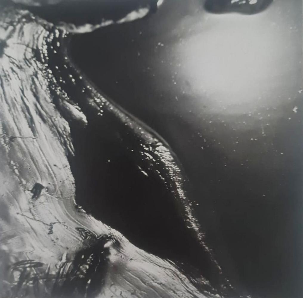 Ralph Eugene, Landscape and sun reflection, 1963: Photographer: Ralph Eugene Meatyard (May 15, 1925 ? May 7, 1972) was an American photographer from Normal, Illinois, U.S. Meatyard purchased his first camera in 1950 to photograph his newborn first ch