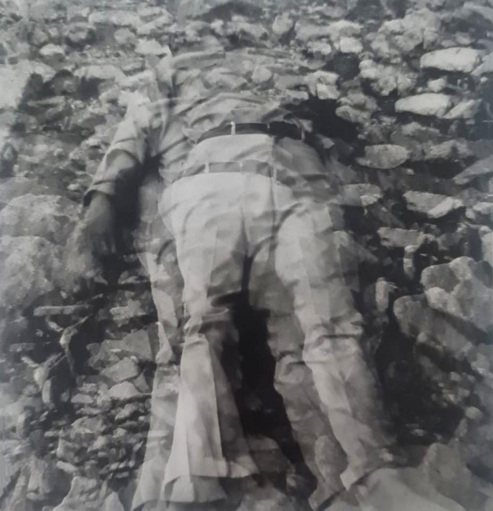 Ralph Eugene, Prone man on rocks, 1968: Photographer: Ralph Eugene Meatyard (May 15, 1925 - May 7, 1972) was an American photographer from Normal, Illinois, U.S. Meatyard purchased his first camera in 1950 to photograph his newborn first ch