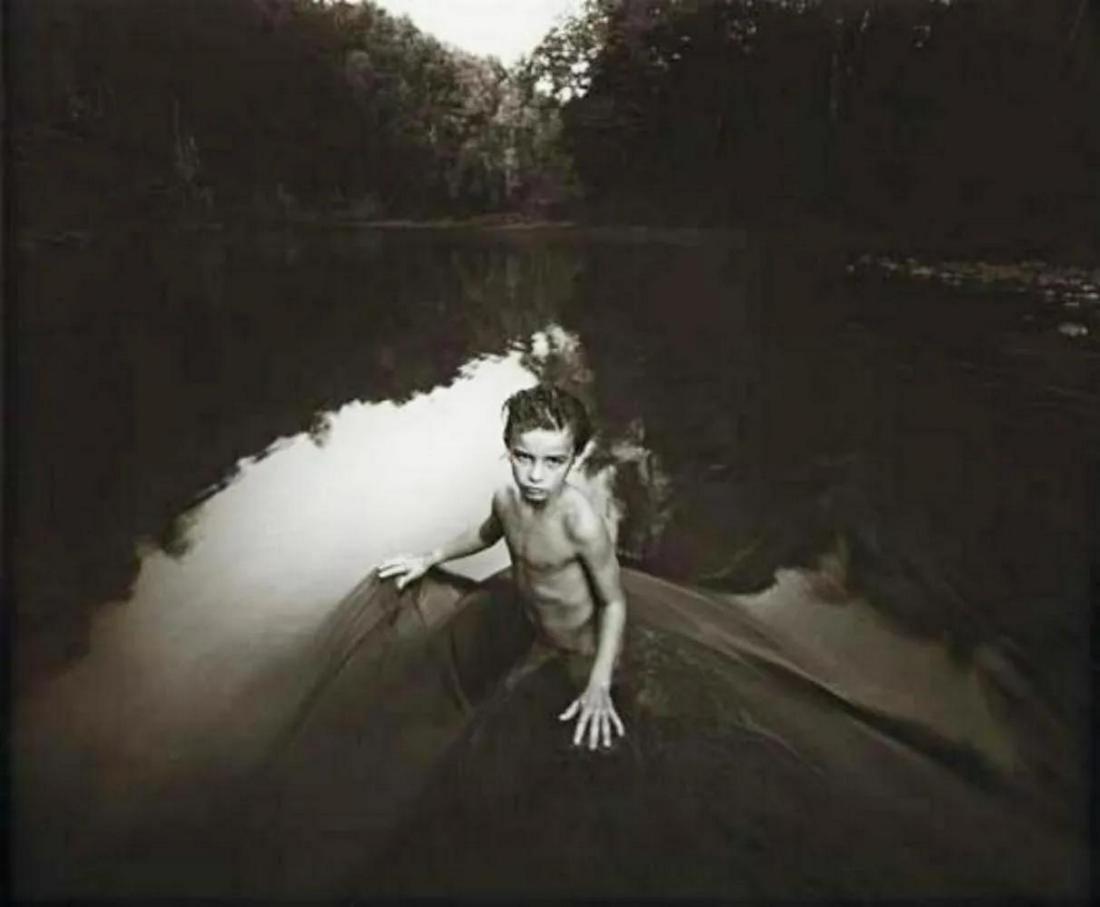 SALLY MANN - The last time Emmett modeled, 1987: Photographer: Sally Mann is an American photographer, widely known for her large-format, black-and-white photographs - at first of her young children, then later of landscapes suggesting decay and dea
