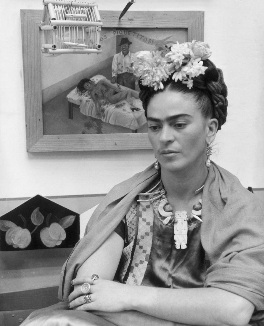 Wallace Marly, Frida Kahlo, and behind her, A few small Nips, 1938: Photographer: Wallace Marly Subject/Title: Frida Kahlo, and behind her, A few small Nips Date Of Negative: 1938 Type Of Print: Authentic Vintage Sheet Fed Photogravure/Heliogravure Date Of Print: 2021
