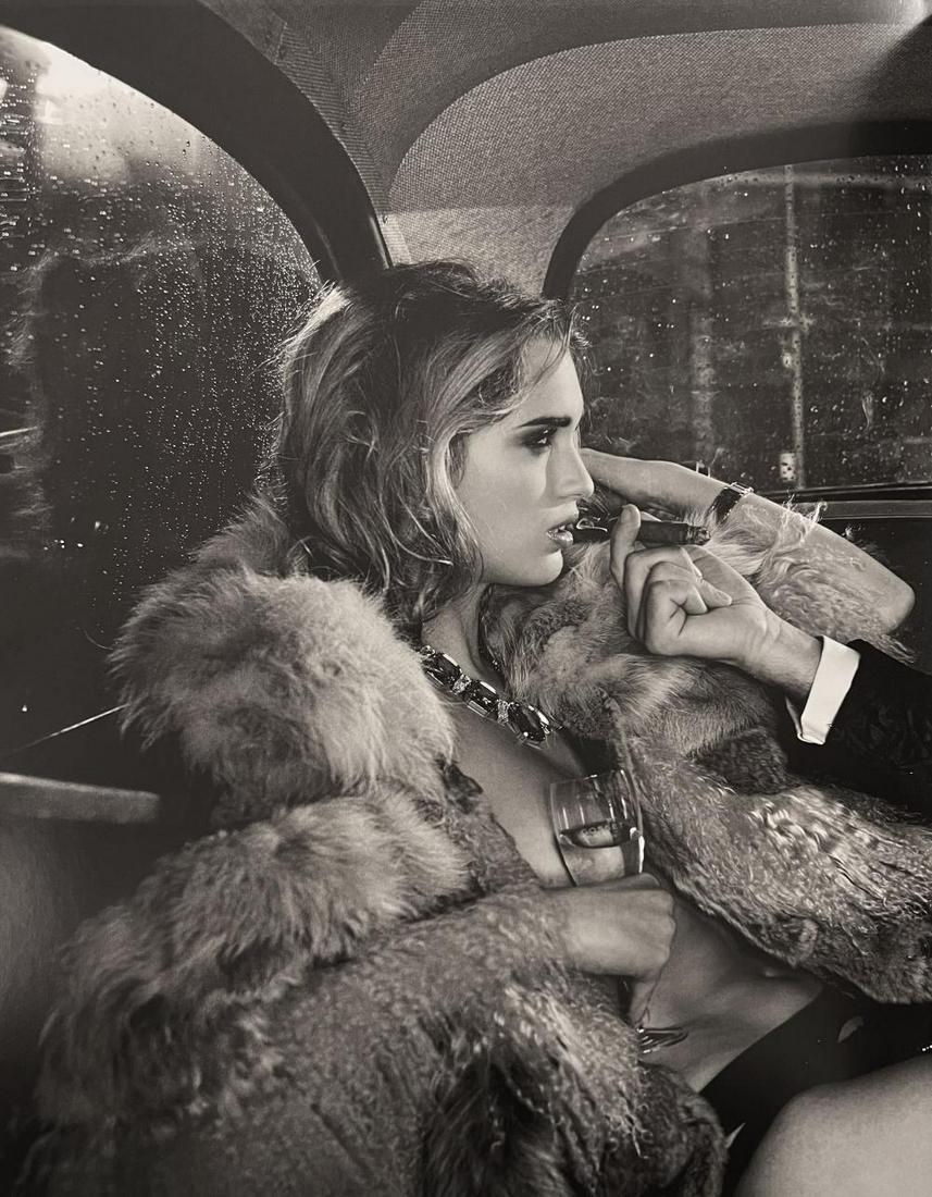 MARC LAGRANGE - Taxi Girl (Black & White), 2010: Photographer: Marc Lagrange was a Belgian photographer known for his nude portraits of female figures. Lagrange created dream-like and fantastical narrative pictures populated by beautiful nudes that