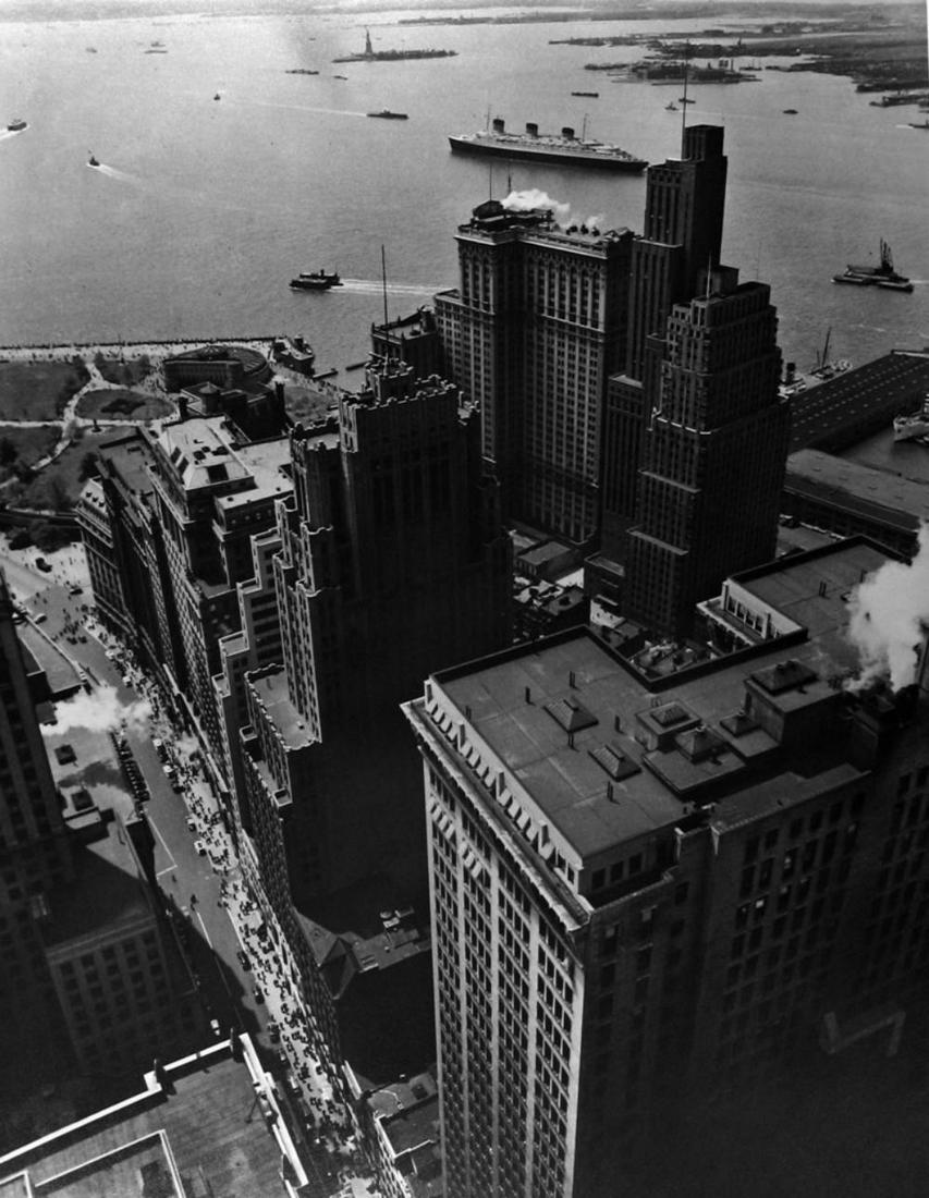BERENICE ALICE ABBOTT, BROADWAY TO THE BATTERY, 1938: Photographer: Berenice Alice Abbott was an American photographer best known for her portraits of between-the-wars 20th century cultural figures, New York City photographs of architecture and urban des
