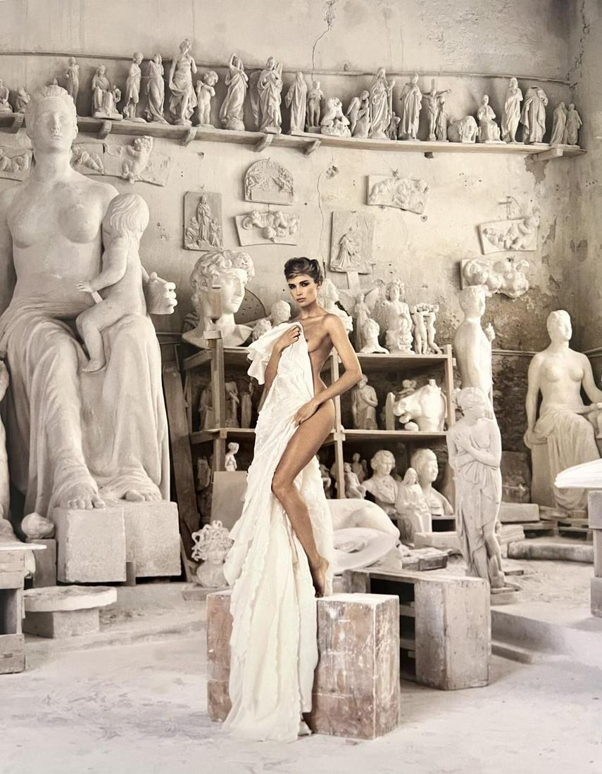 Marc Lagrange, Extrinsic, 2000's: Photographer: Marc Lagrange was a Belgian photographer known for his nude portraits of female figures. Lagrange created dream-like and fantastical narrative pictures populated by beautiful nudes that
