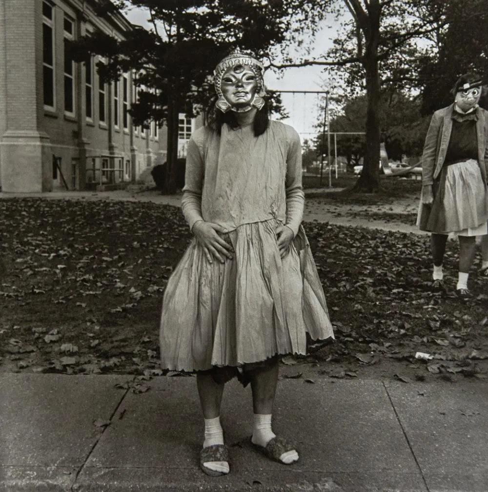 DIANE ARBUS - Girl in Mask. 1970: Photographer: Diane Arbus Born: March 14, 1923, New York, New York, United States. Died: July 26, 1971, Westbeth Artists Housing, New York, United States. Diane Arbus was an American photographer. Arb