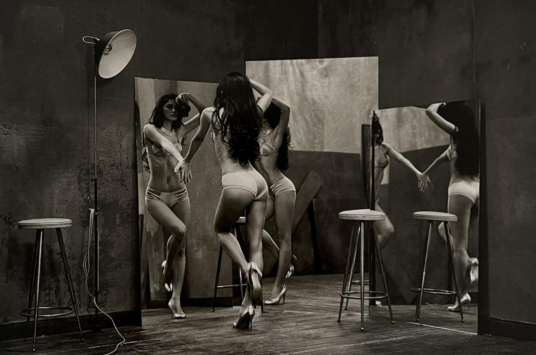 Marc Lagrange, Unveiling, 2000's: Photographer: Marc Lagrange was a Belgian photographer known for his nude portraits of female figures. Lagrange created dream-like and fantastical narrative pictures populated by beautiful nudes that