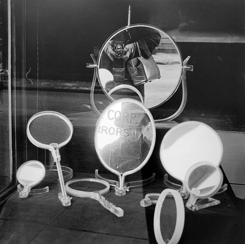 Vivian Maier, Self-portrait, New York, 1955: Photographer: Vivian Dorothy Maier, (1926-2009) was an American street photographer whose work was discovered and recognized after her death. She worked for about 40 years as a nanny, mostly on Chicag