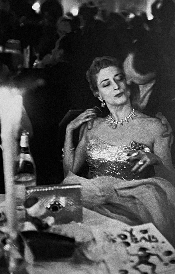 Robert Franks, Charity Ball- New York City: Photographer: Robert Frank (1924-2019) was a Swiss photographer and documentary filmmaker, who became an American binational. His most notable work, the 1958 book titled The Americans, earned Frank co