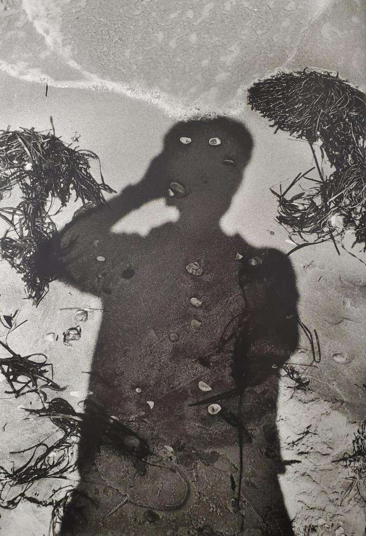 Elliot Erwitt , Shadow on the Beach: Photographer: Elliott Erwitt is a French-born American advertising and documentary photographer known for his black and white candid photos of ironic and absurd situations within everyday settings. Ti