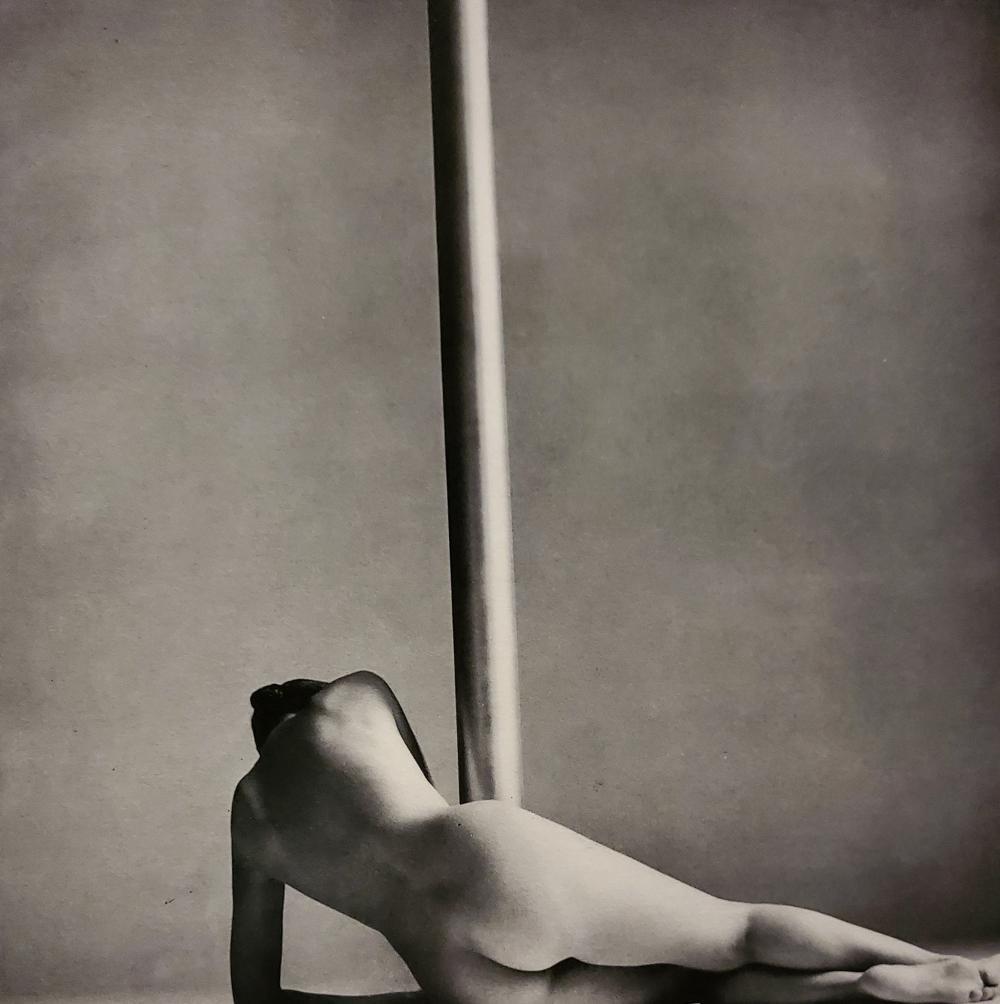 John Swannell, Woman With Pole, 1980'S: Photographer: John Swannell was born in 1946. After leaving school at 16, he worked first as an assistant at Vogue Studios and then assisted David Bailey for four years before setting up his own studi