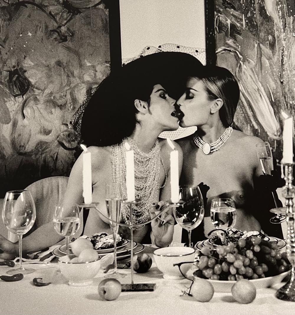 Marc Lagrange, Four Women At Dinner, 2000: Photographer: Marc Lagrange was a Belgian photographer known for his nude portraits of female figures. Lagrange created dream-like and fantastical narrative pictures populated by beautiful nudes that
