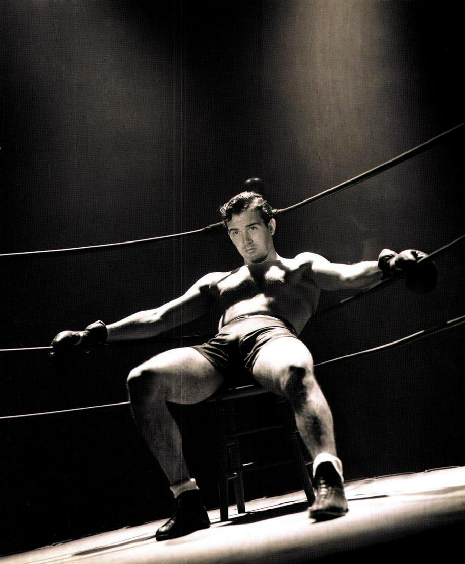 George Hurrell, John Payne, 1953: Photographer: GEORGE HURRELL Subject: John Payne Date Of Negative: 1953 Type Of Print: Vintage Photogravure. Date Of Print: 2013 Paper: Medium weight, satin/matte finish Print Origin: USA Print/Plate