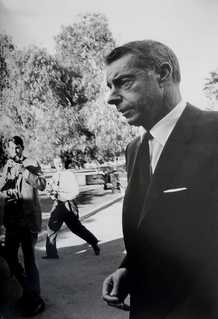 Lawrence Schiller, Joe DiMaggio At The Funeral Of Marilyn Monroe, 1962: Photographer: Lawrence Schiller is an American producer, screenwriter, and photographer best known for his candid photos of Marilyn Monroe. Subject/Title: Joe DiMaggio At The Funeral Of Marilyn Monroe